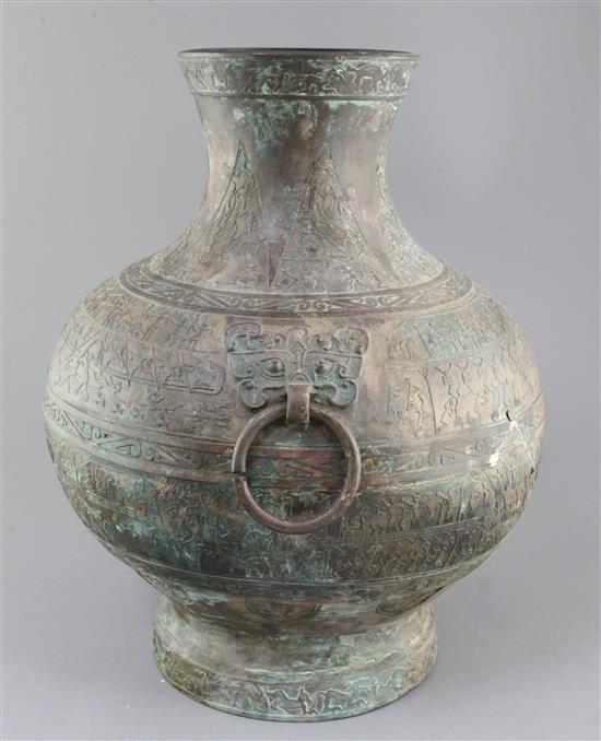 A rare and large Chinese archaic bronze ritual drinking vessel, Hu, Warring States period 5th-3rd century B.C., approx. 50cm high, repa
